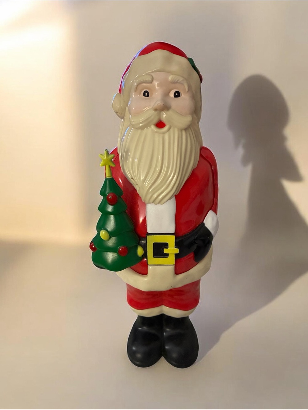Red Santa Figurine Holiday Decoration with Green Tree